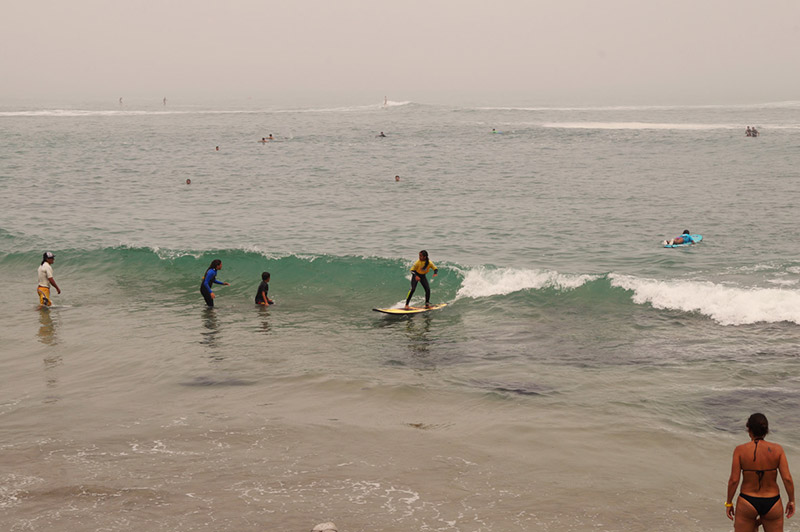 A local girl in Punta Hermosa learning to surf.